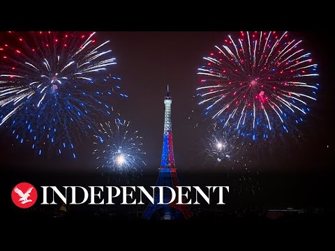 Watch again: Fireworks light up the skies around the Eiffel Tower on Bastille Day