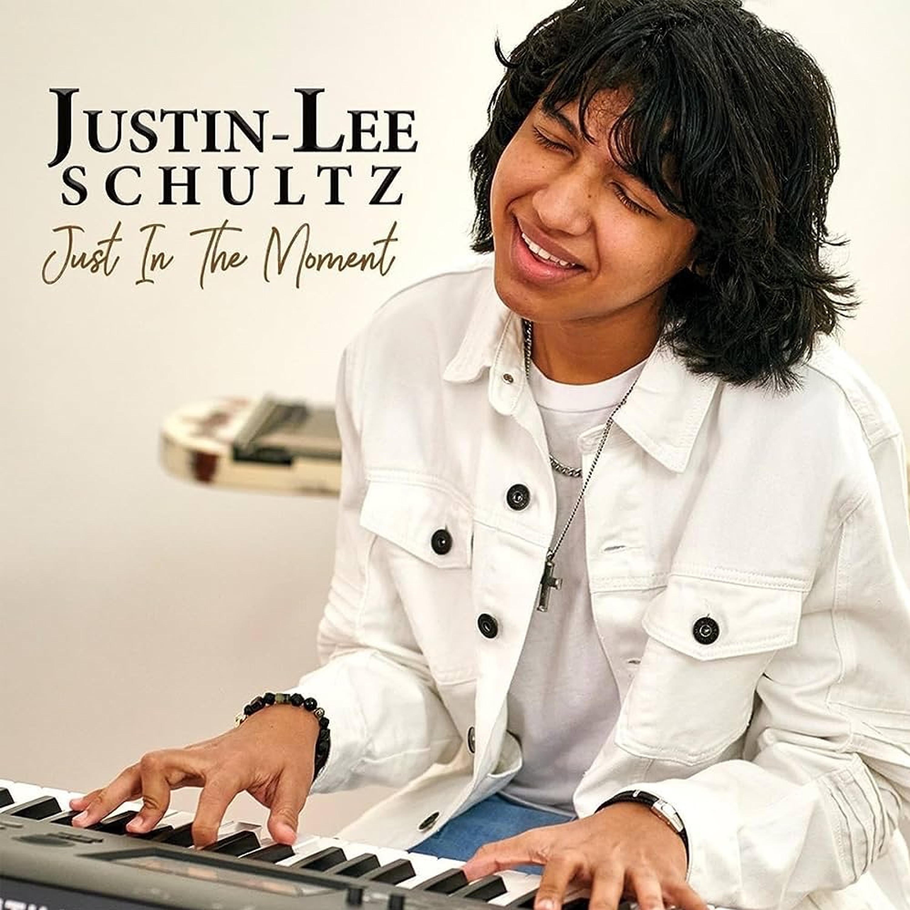 ⁣Justin-Lee Schultz - JUST IN THE MOMENT