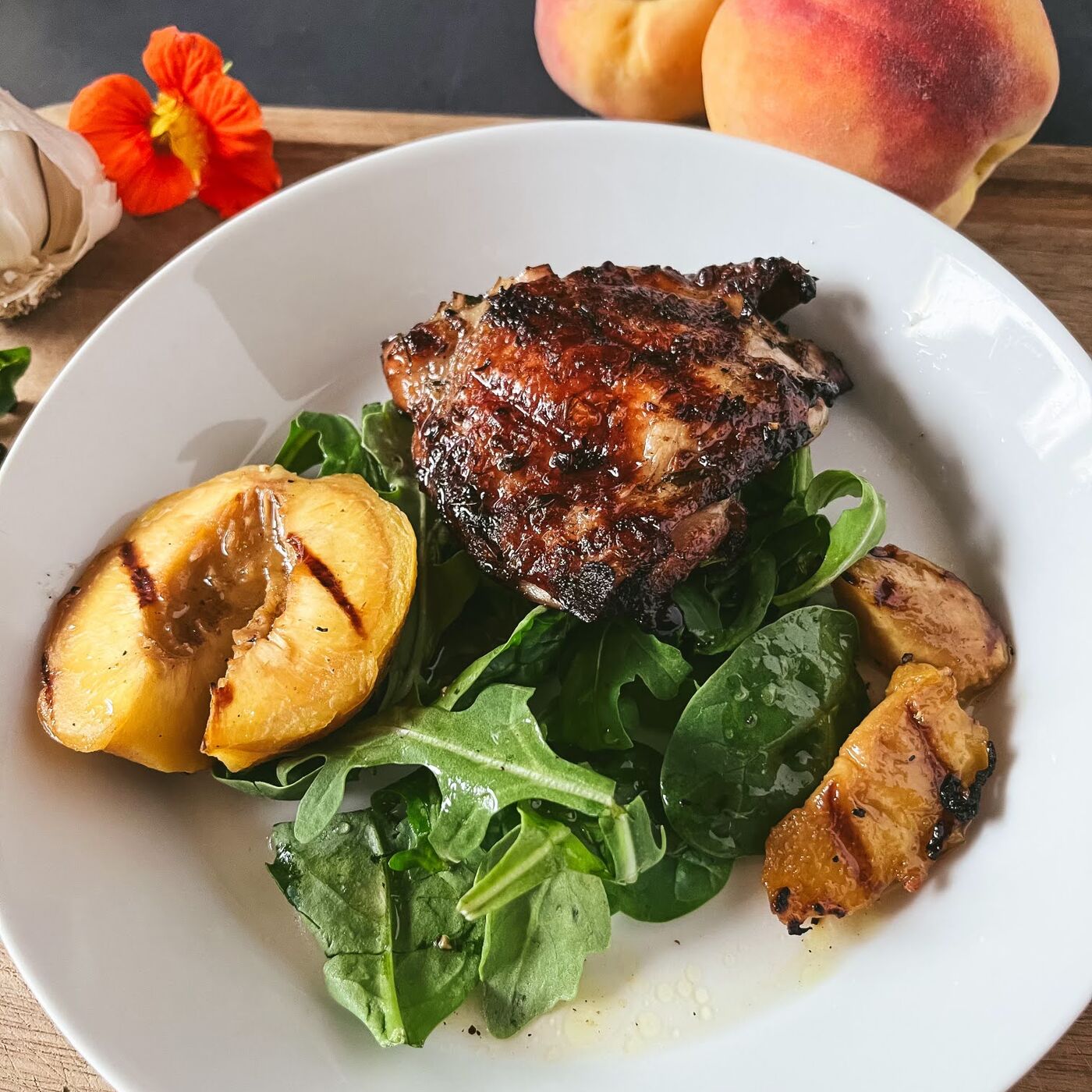 ⁣Pickled Peaches with Grilled Chicken Thighs