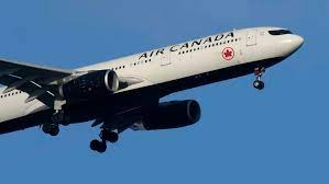 Disgusted Air Canada passengers bored from flight over sick on seats.